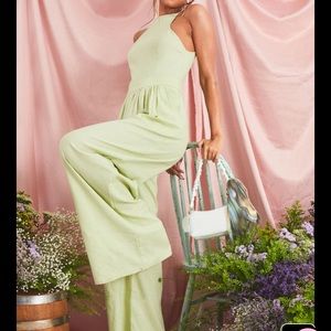 Sage green racer neck linen wide leg jumpsuit